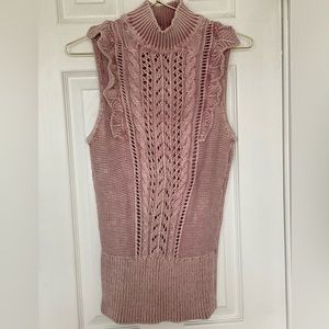 Sleeveless mock neck sweater